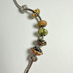 Lampwork Glass Slider Beads on Silver Tone Bracelet with Two Stopper Beads - 7"